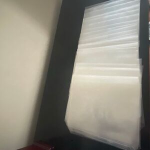 Large bundle 92 of Clear transparent presentation paper sheet protector sleeve